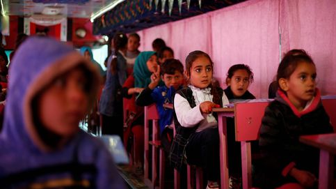 Un autobús convertido en escuela infantil en Bagdad