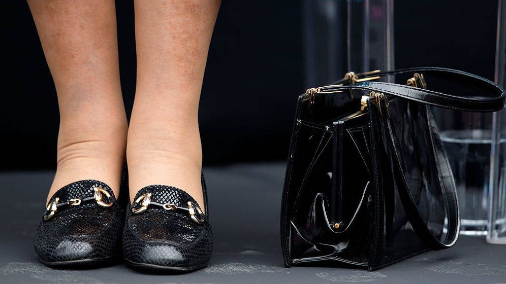 Foto: A los pies de la reina Isabel II. (Getty)